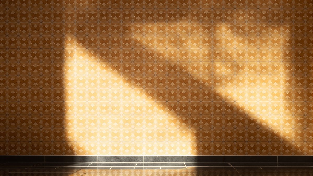 Riad courtyard wall with zellige tile work in ochre and terracotta lit by afternoon sunlight